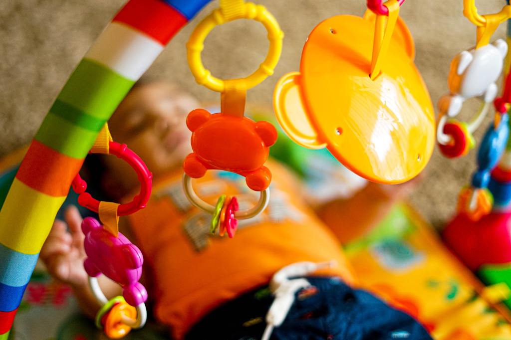 Baby bouncer with hanging toys